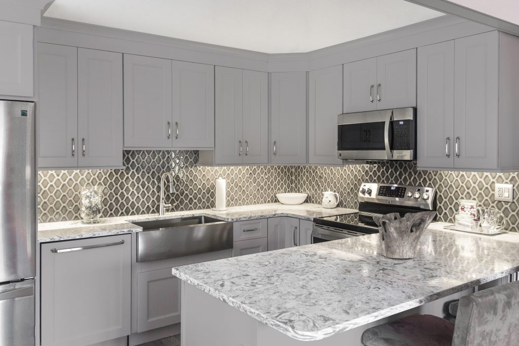 Grey Cabinets with Marble Countertops